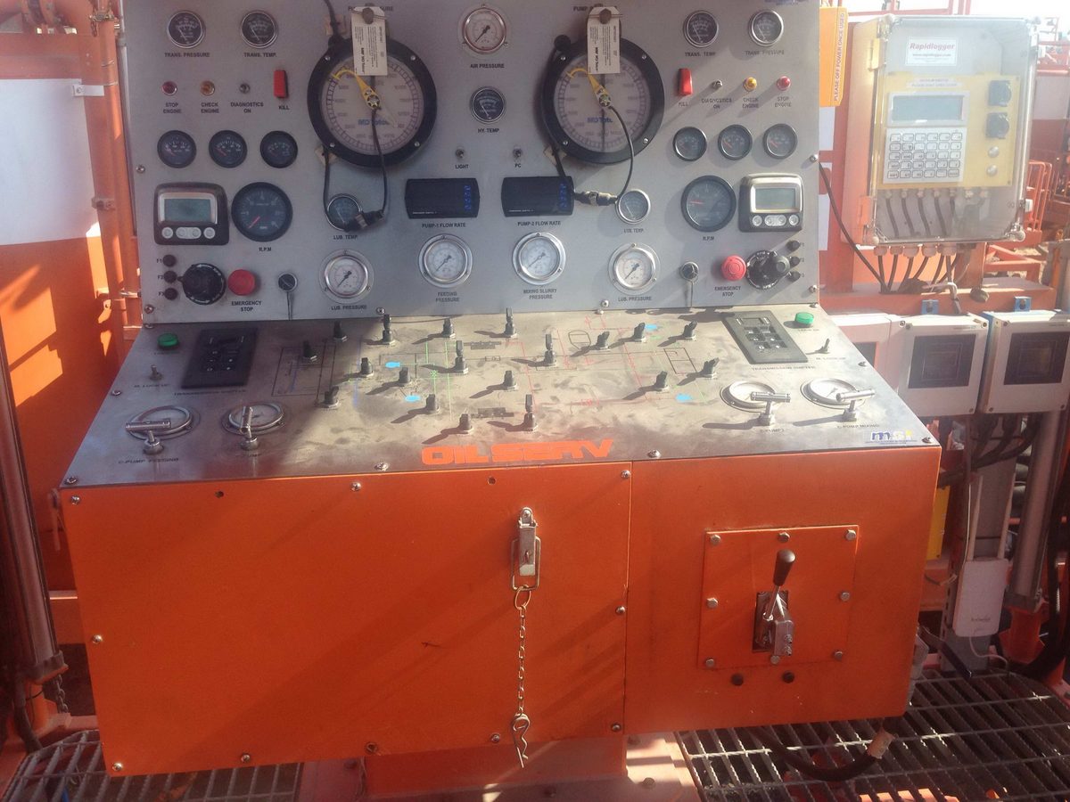 OilSERV cementing unit control panel with the Rapidlogger RapidDCC unit mounted beside it
